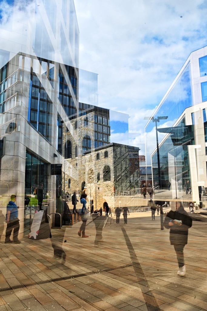 Pudsey Camera Club Member Image Contemporary city scene with glass skyscrapers and pedestrians at Pudsey Camera Club.