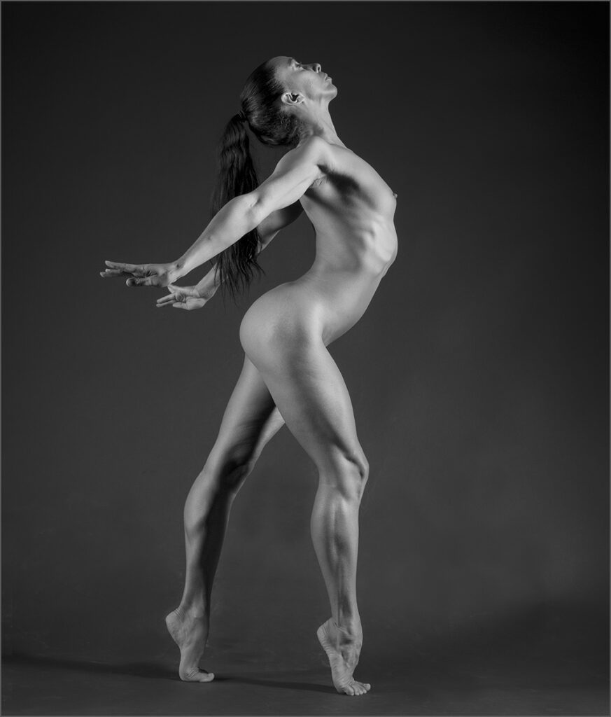 Graceful nude female dancer in a dynamic pose at Pudsey Camera Club.