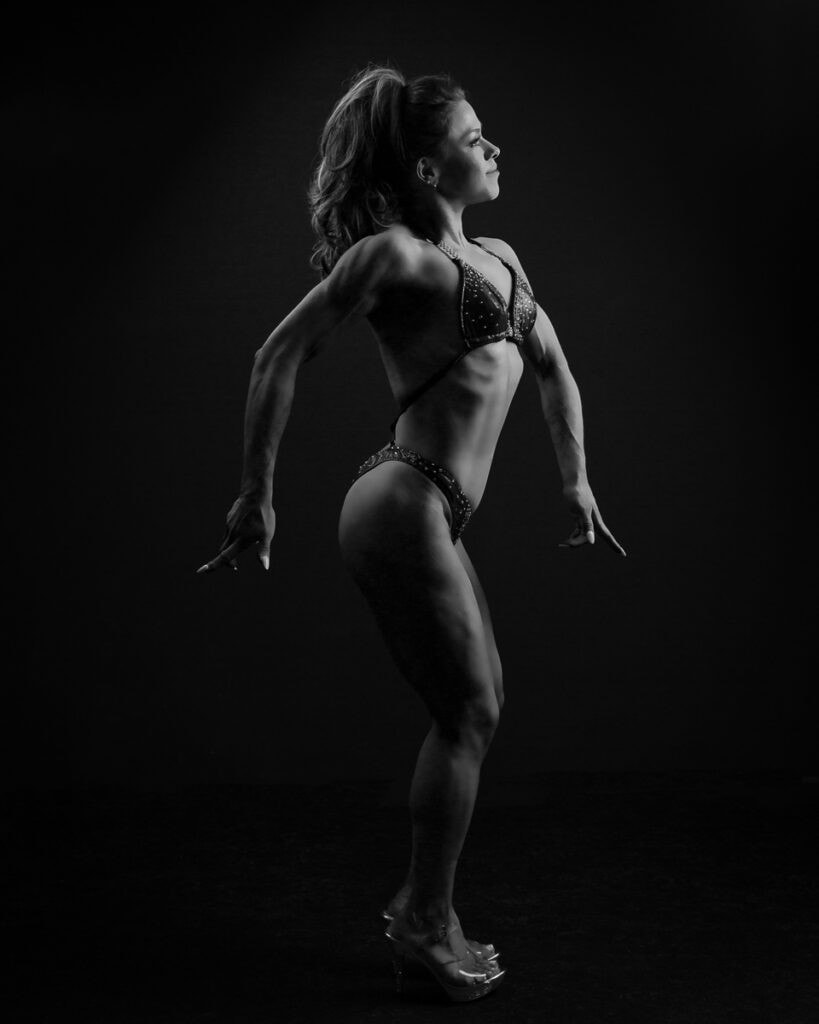 Fitness model showcasing muscular physique at Pudsey Camera Club event.