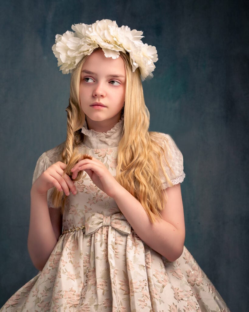 Young girl with floral crown and vintage dress at Pudsey Camera Club.
